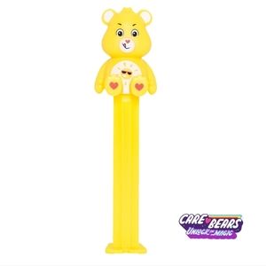 Care Bears A Funshine Bear PEZ Dispenser packaged in a polybag. 